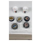 Sabers And Braves Hockey Pucks And Cups.