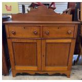 Jam Cabinet Featuring Scalloped Backsplash