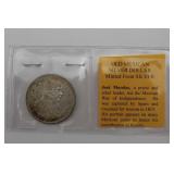 1 Mexican Silver Dollar