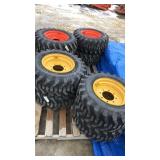 12-16.5 Skid Steer Tires and Rims (x4)