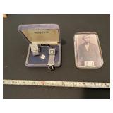 Cuff links and Abe Lincoln paperweight