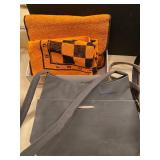 Handbags and checkered beach towel