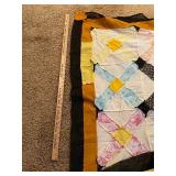 64x76 yellow and black quilt top only