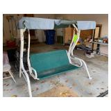 Outdoor swing with cushion