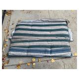 Outdoor swing with cushion