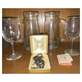 Catholic prayer book w/ rosary and coins, glasses and mugs