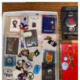 Collection of pins, zippo keychain, bowling pins