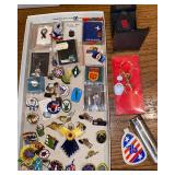 Collection of pins, zippo keychain, bowling pins