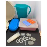 Tupperware, veggie tray, pitcher, popsicle maker some lids damaged.