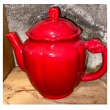 Red tea kettle with glassware