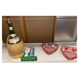 Old bottle, scissor sharpener, heart baskets, Desire street car