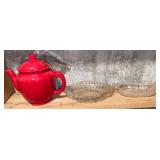 Red tea kettle with glassware