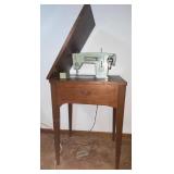 Vintage Sears Kinmore sewing machine-powers on