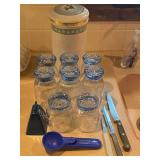 Glasses, canaster, knives