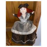 Tall brass lamp fixture, shelf doll