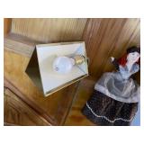 Tall brass lamp fixture, shelf doll