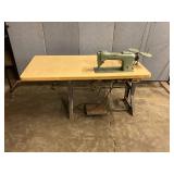 Consew commercial sewing machine on table
