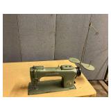 Consew commercial sewing machine on table
