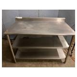 55 x 30 x 36 all Stainless table triple shelf