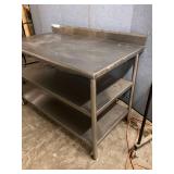 55 x 30 x 36 all Stainless table triple shelf
