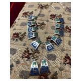 two Aztec-style necklace with earring sets