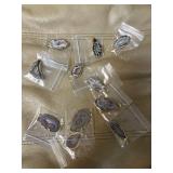 11 polished geode pendants