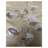 11 polished geode pendants