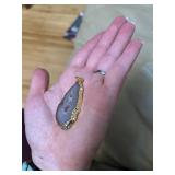 11 polished geode pendants