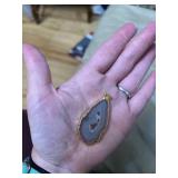 11 polished geode pendants