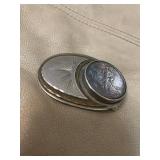 belt buckle - used - 1993 appears to be Silver Eagle