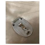 belt buckle - used - 1993 appears to be Silver Eagle