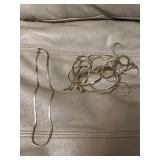 9 gold colored chains