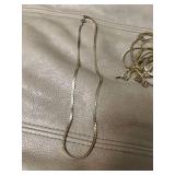 9 gold colored chains