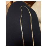 9 gold colored chains