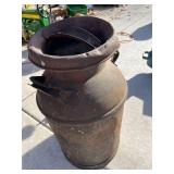 cream can lid is rusted