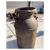 cream can lid is rusted