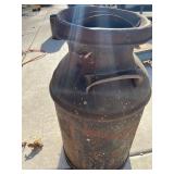 cream can lid is rusted