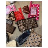 assorted wallets and coin purses