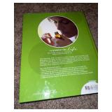 two like new condition essential oil hardback books