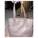 Michael kors purse - outside looks very nice, inside is a little dirty