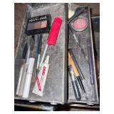 makeup tote with some products inside