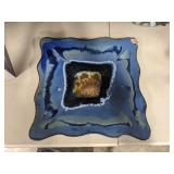 blue stone-like display plate