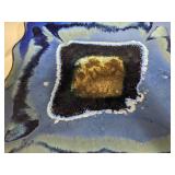 blue stone-like display plate