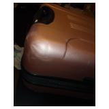 Travelers Club hard shell suitcase on wheels - Retails for $60