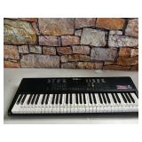 RockJam 61 Portable Electronic Keyboard with Key Note Stickers, Power Supply and Simply Piano App Content, Compact (RJ361)- Retail $69