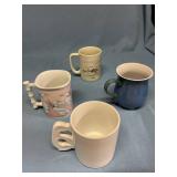 Four duck/goose themed coffee mugs