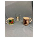 Two coffee mugs and a glass tankard inscribed Lance