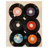 45 rpm records with a country flair featuring Tennessee Ford, Marty Robbins, George Jones, Oak Ridge Boys and more