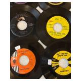 45 rpm records with a country flair featuring Tennessee Ernie Ford, Don Gibson, Johnny Cash and more