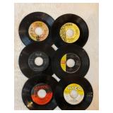 45 rpm records featuring Cher, Bette Midler, Bee Gees and more